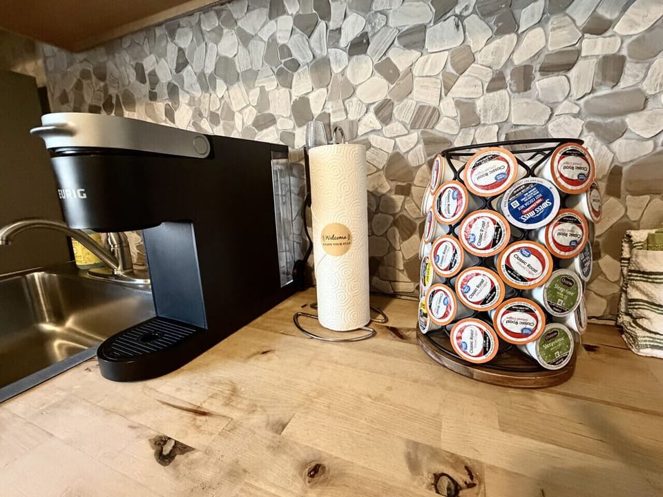 Stocked with premium coffee, water, and snacks!