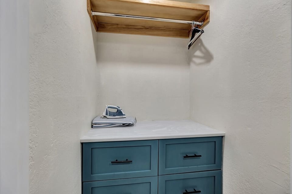 Extra storage space w/ shelf & hanging rod to keep belongings organized