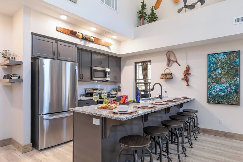 Whether you’re preparing a quick breakfast or a family feast, this fully equipped kitchen features modern appliances, an air fryer, Instant Pot, and spacious island seating perfect for gathering, dining, and making memories.