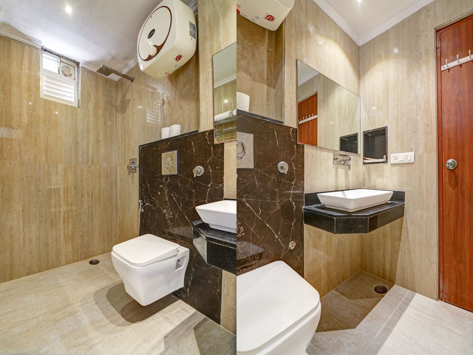 Executive Double Room, 1 Bedroom, Non Smoking, City View | Bathroom | Hydromassage showerhead, designer toiletries, hair dryer, slippers