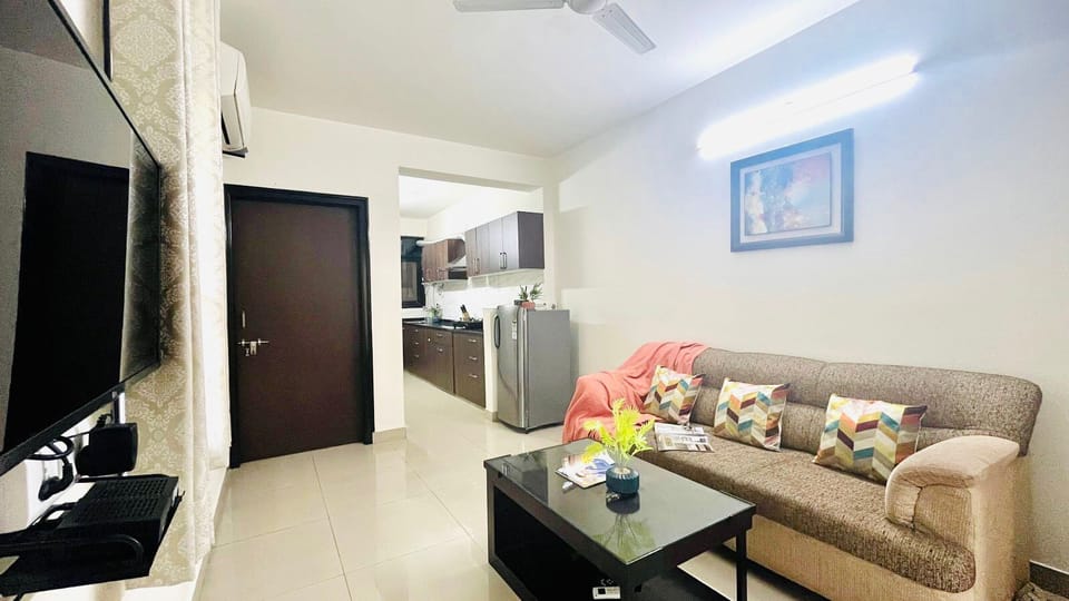 Standard Apartment, 1 Bedroom, Kitchen | Living area | Flat-screen TV, fireplace