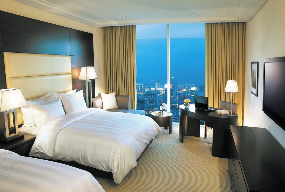 In-room safe, laptop workspace, blackout drapes, soundproofing
