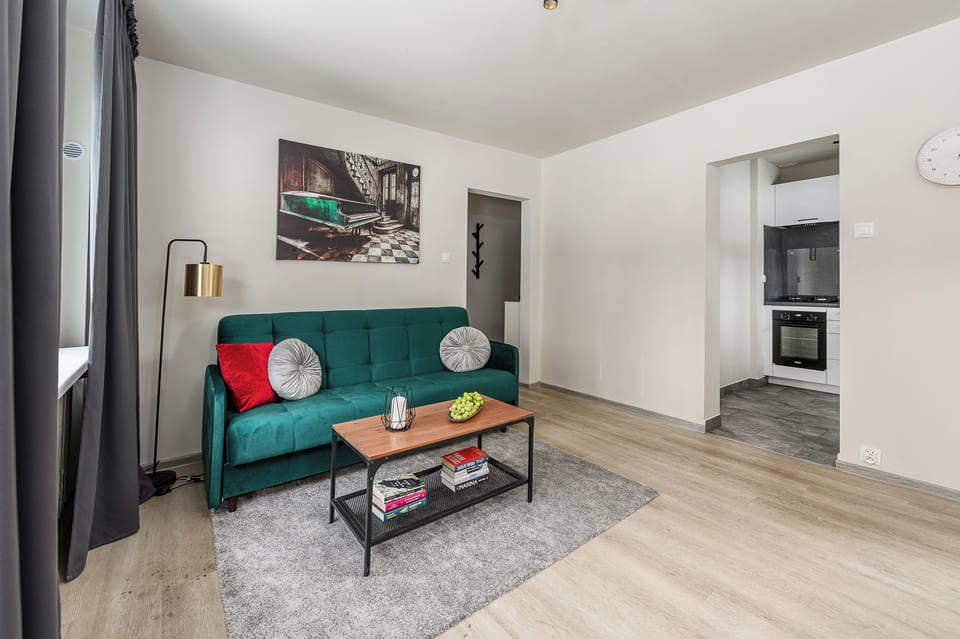 Comfort Apartment, Courtyard View | Living room | 40-inch flat-screen TV with digital channels