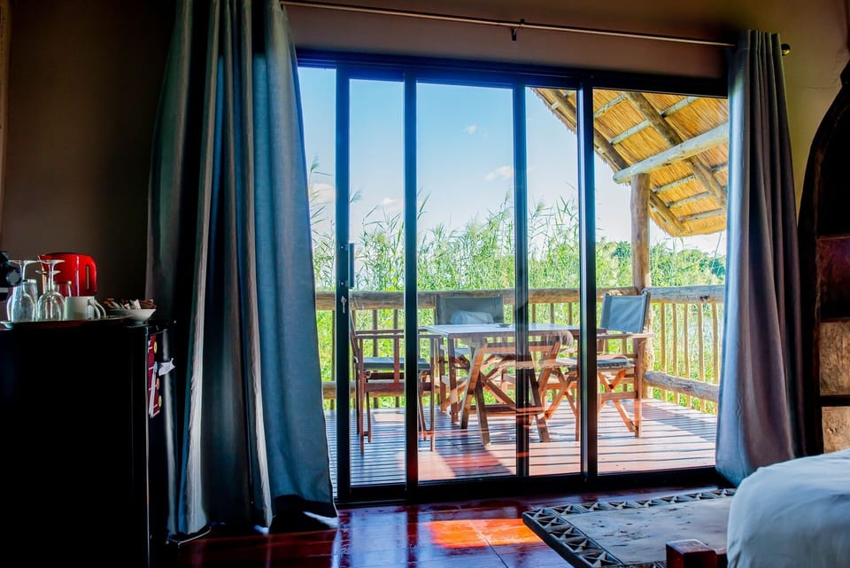 Luxury Cabin, Balcony, River View | In-room safe, iron/ironing board, free WiFi