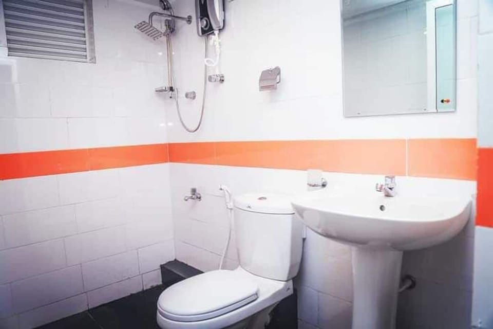 Shower, towels, soap, toilet paper