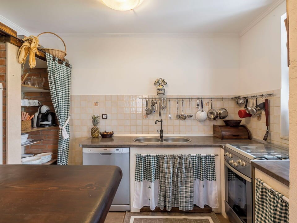 Kitchen, Interior Design, Countertop, Flooring, Wood, Kitchen Appliance, Furniture, Major Appliance, Cabinetry, Floor
