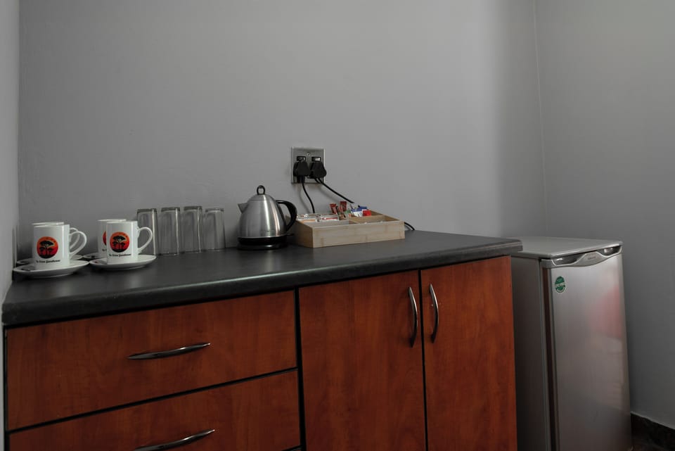 Family Room, Balcony, Garden View | Coffee and/or coffee maker