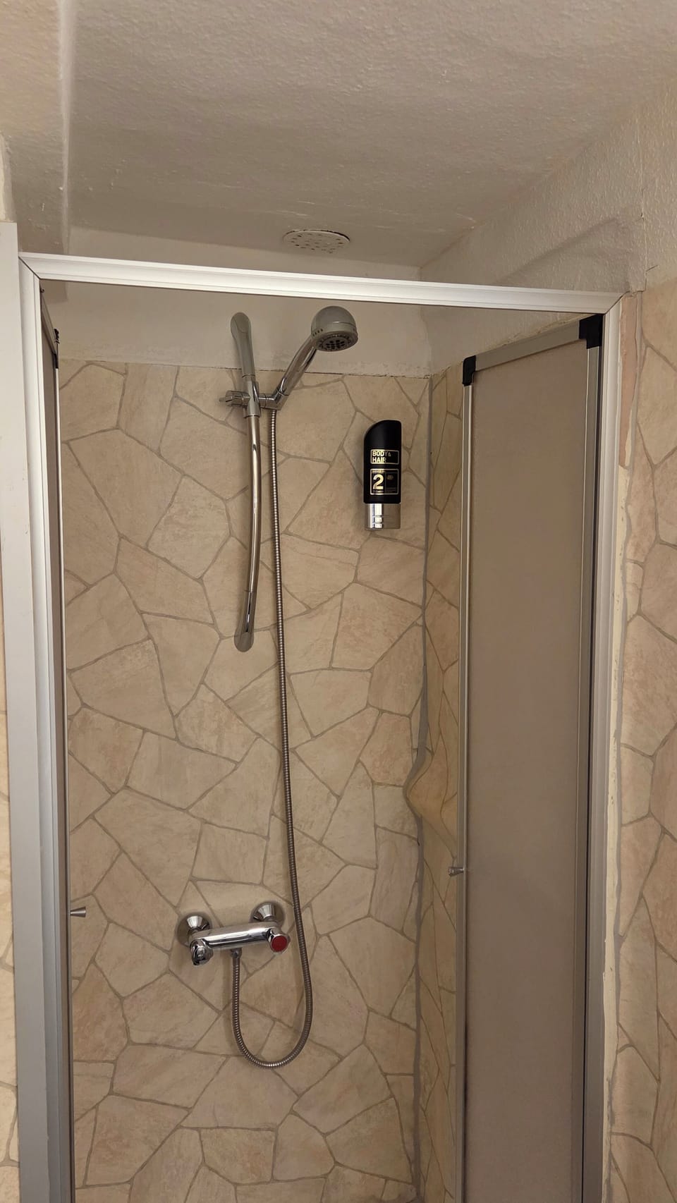 Shower, towels, soap, shampoo