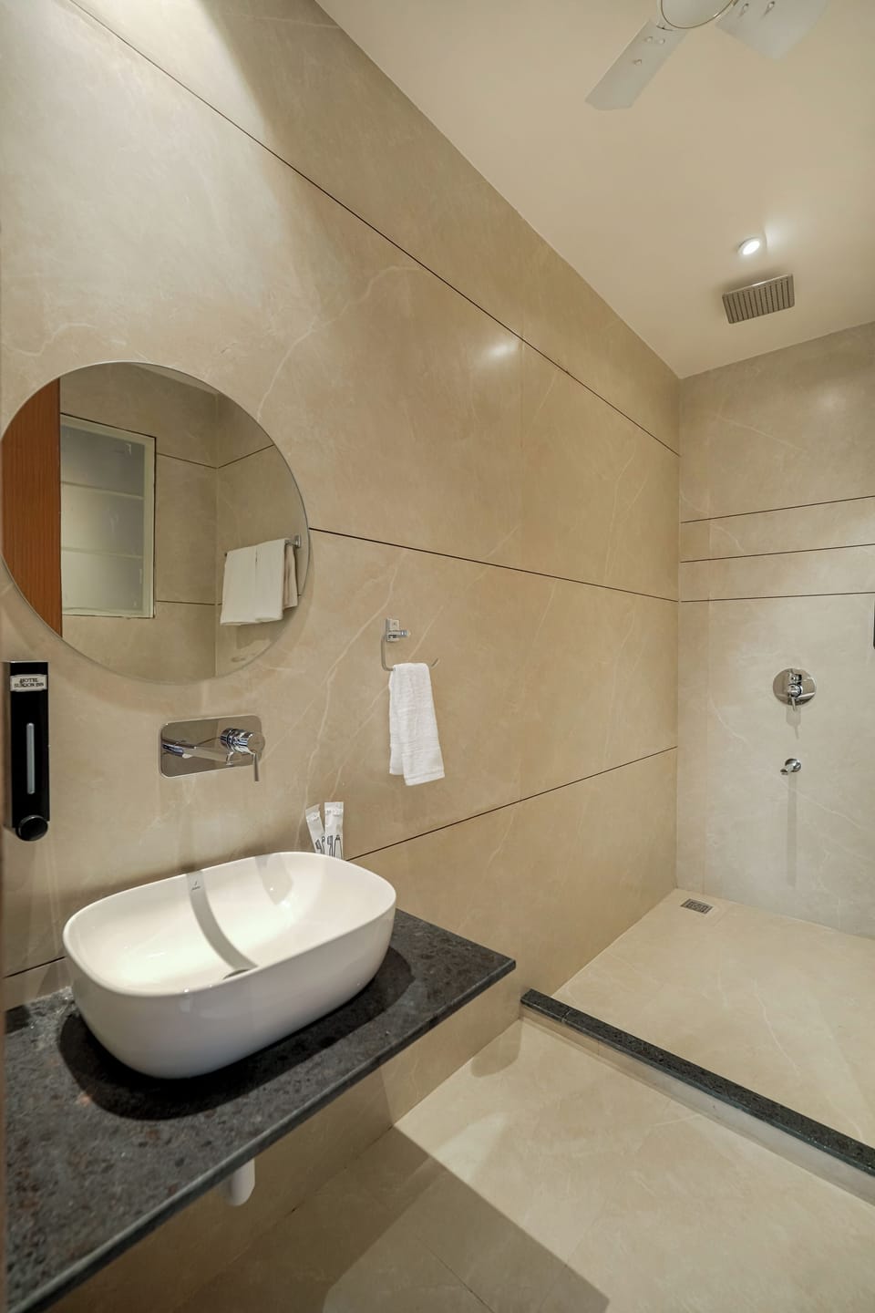 Shower, towels, soap, shampoo