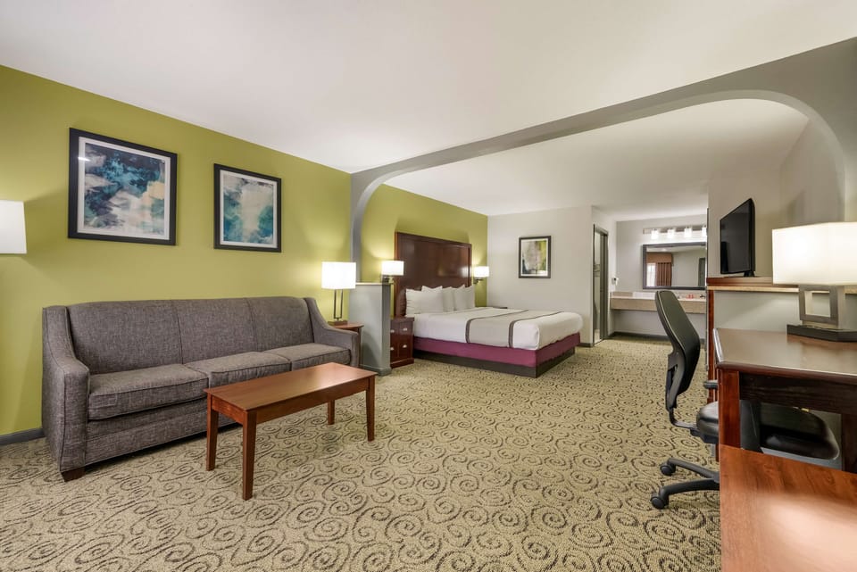 Individually furnished, desk, laptop workspace, iron/ironing board