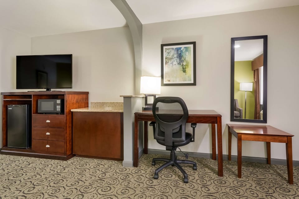 Individually furnished, desk, laptop workspace, iron/ironing board