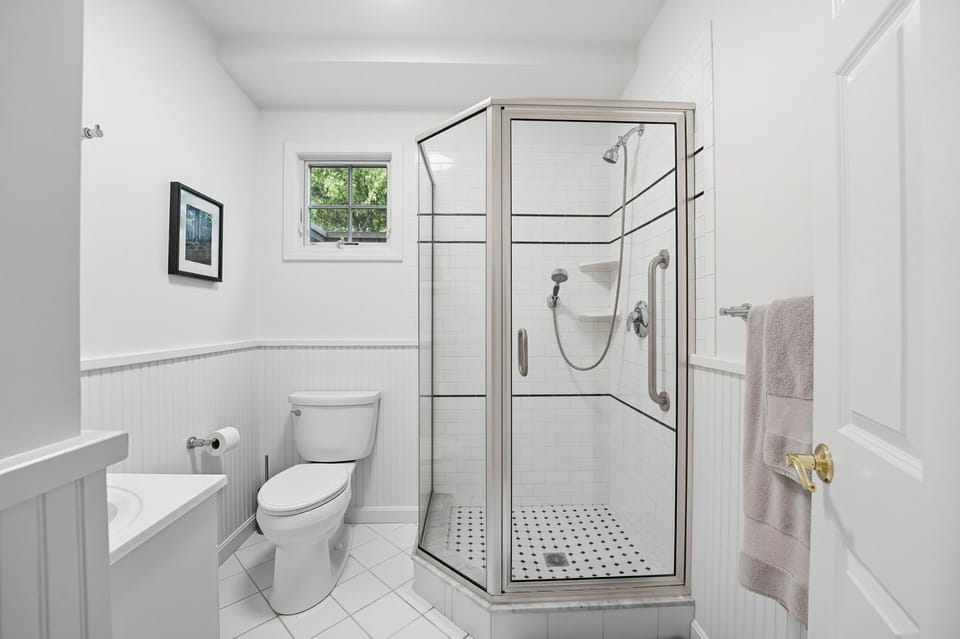 First floor bathroom with stand-up shower. 