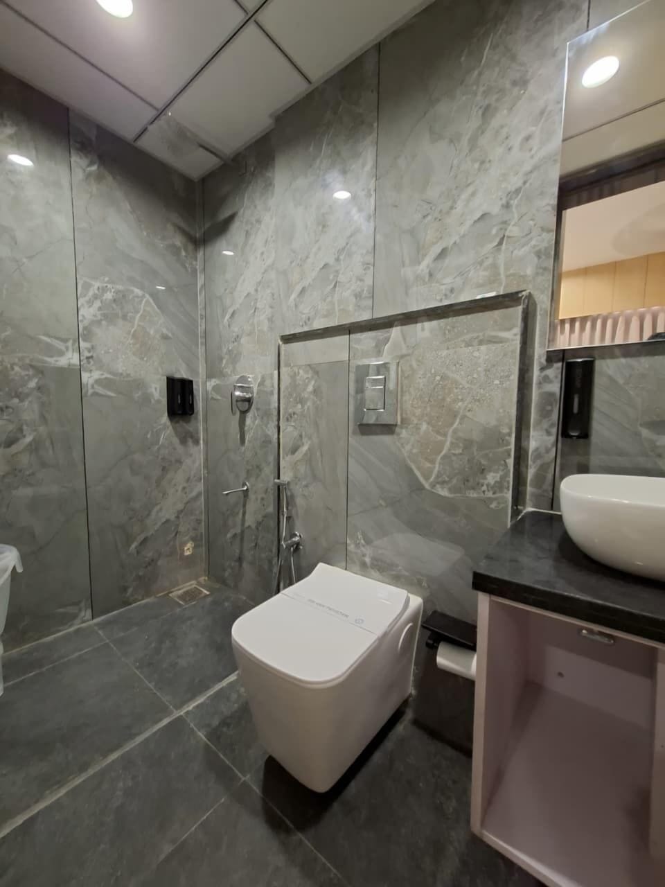 Shower, slippers, towels, soap