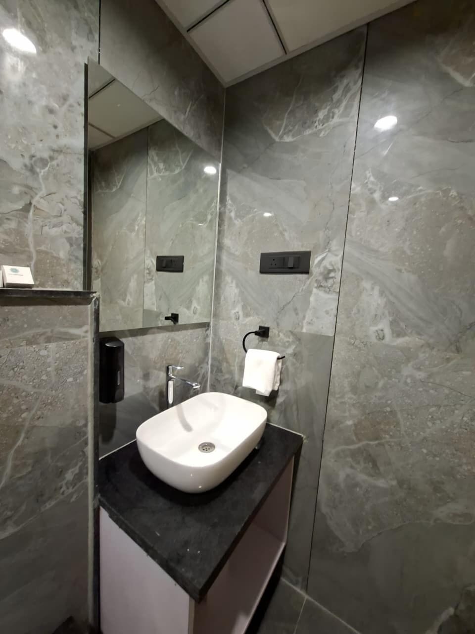 Shower, slippers, towels, soap