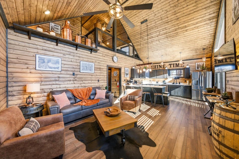 Soaring ceilings and panoramic windows frame stunning mountain views.