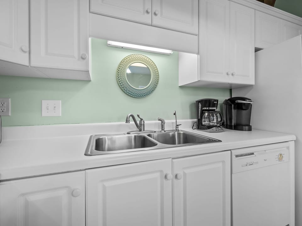 Your bright kitchenette makes meal prep a breeze with fresh coffee ready to fuel your morning adventures.