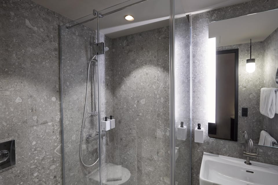 Eco-friendly toiletries, hair dryer, towels, soap