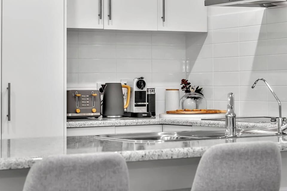 Start your morning with a fresh espresso before heading out for a beach walk.