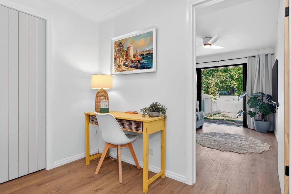The dedicated workspace provides a simple, comfortable place to work or plan the day.
