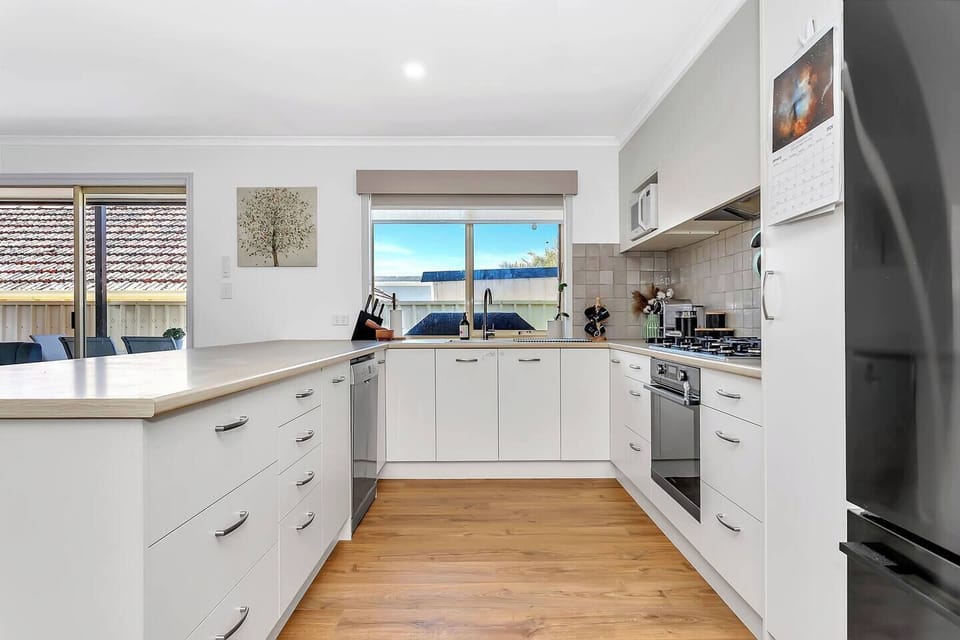 Cook up a feast using quality appliances, generous bench space, and a Nespresso machine to ease into the morning.