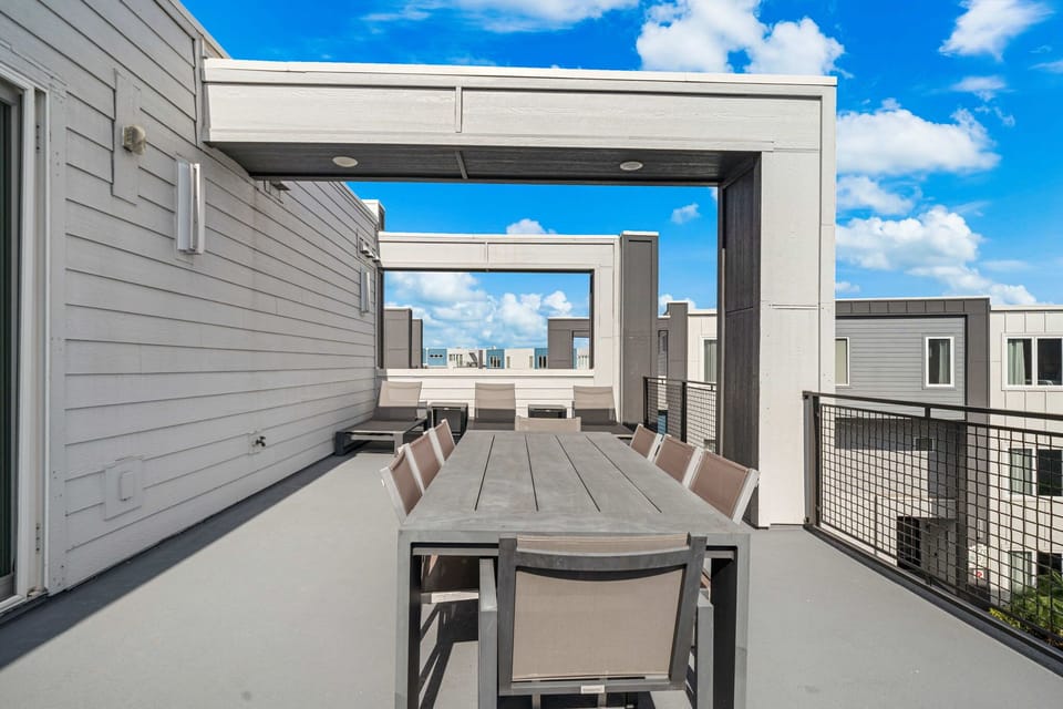 Outdoor dining table for eight plus lounge seating—ideal for morning coffee or evening meals.