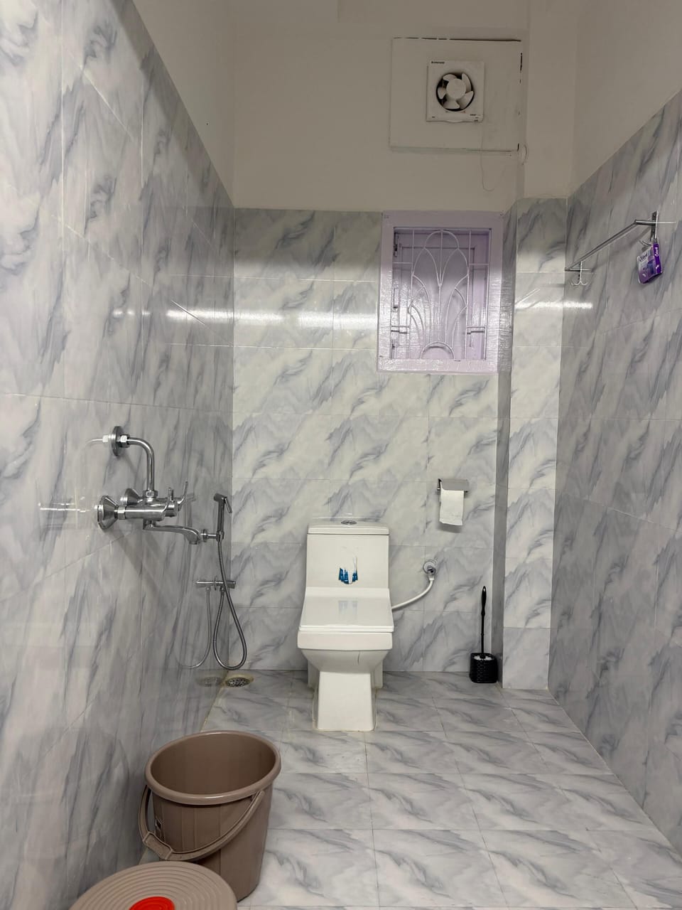 Shower, free toiletries, hair dryer, slippers