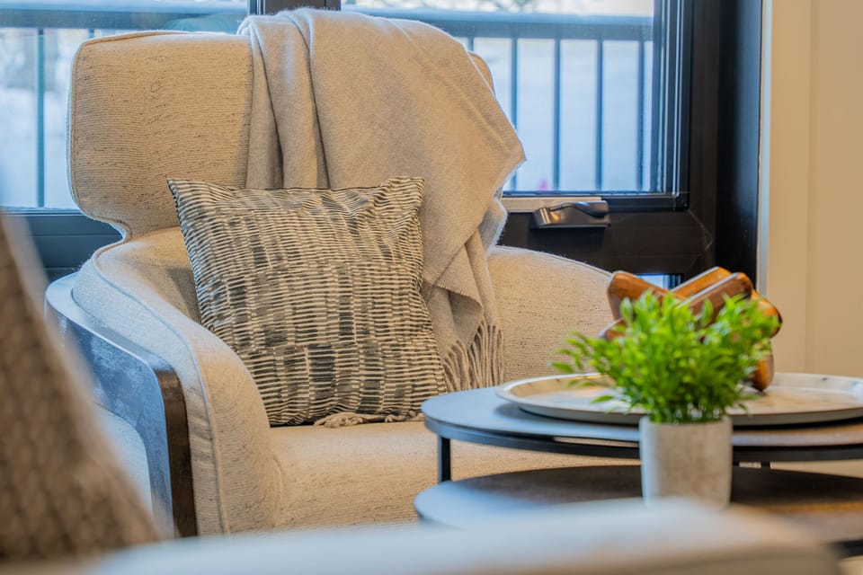 Sink into a cozy chair and unwind with a book.