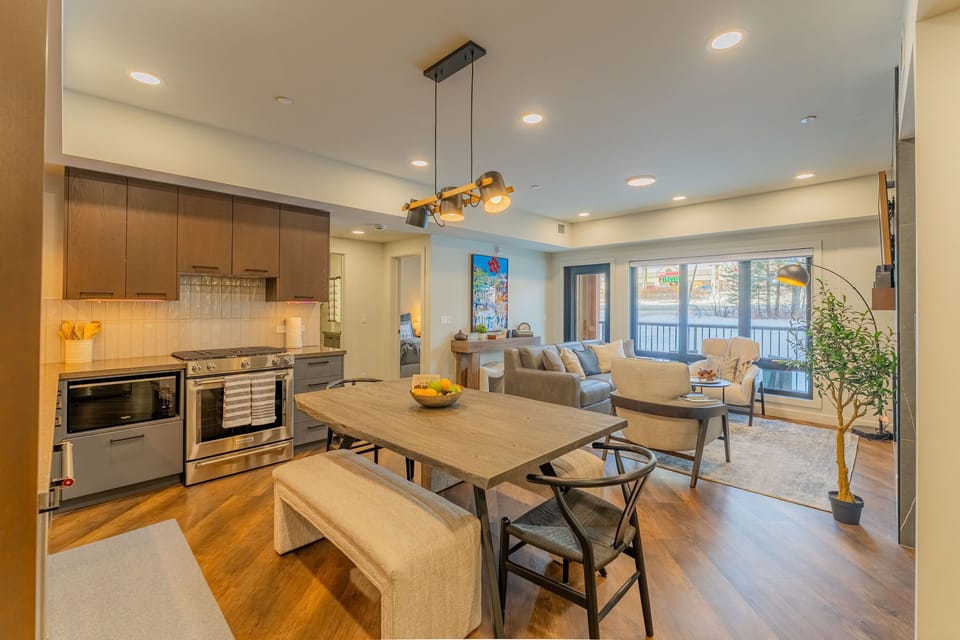 Enjoy bright living spaces with large windows and chic furniture.