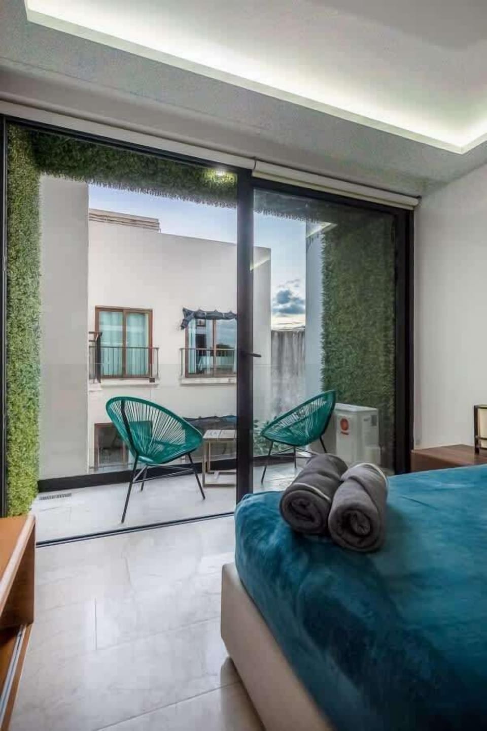 Relax on your private balcony. Enjoy the fresh air & courtyard views.