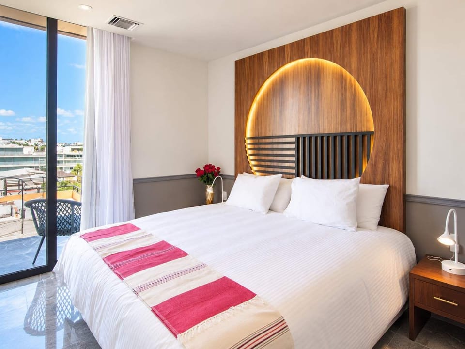 A king-size bed and plenty of design will give you the perfect space to relax.