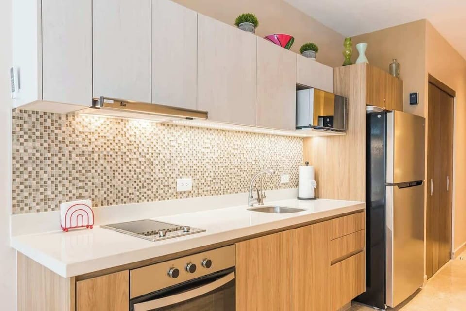 The kitchen space is very spacious and fully equipped.