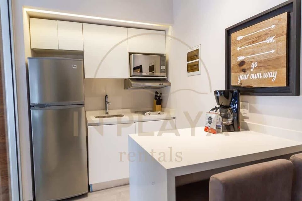 Modern kitchenette; prepare simple meals.