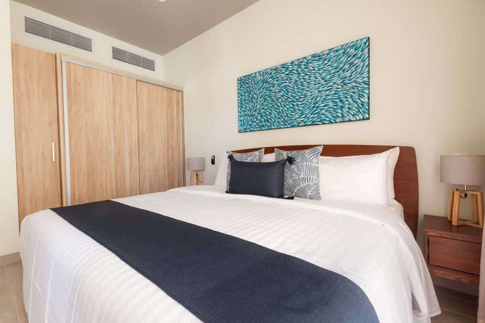 Luxurious bedroom with a comfortable king-size bed.