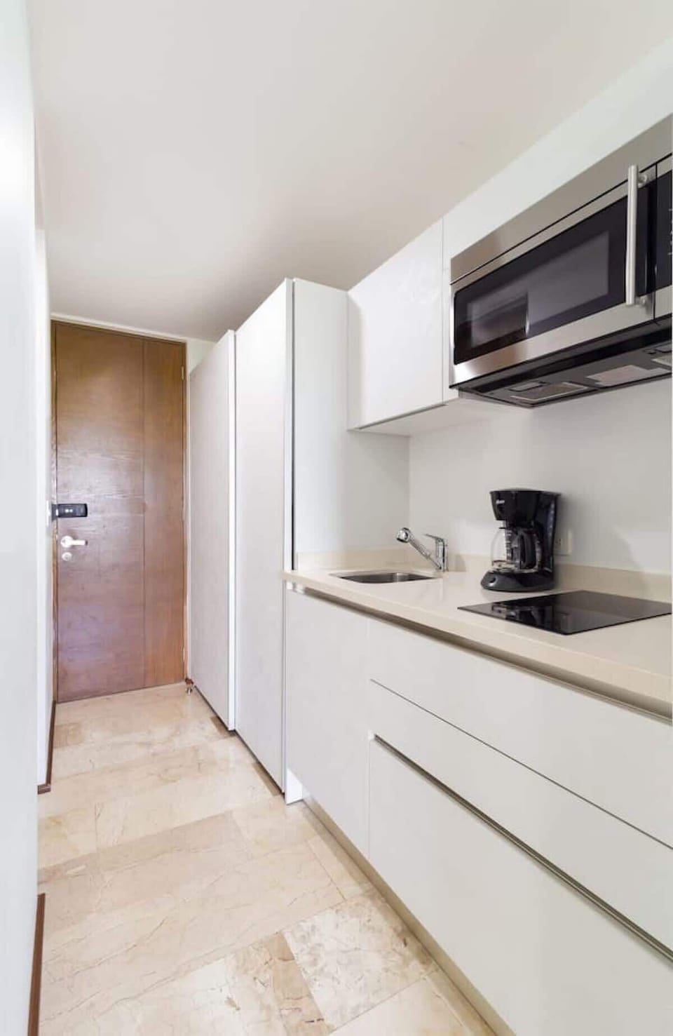 Coffee maker, microwave, stovetop burners and refrigerator... just like at home, but in the Caribbean