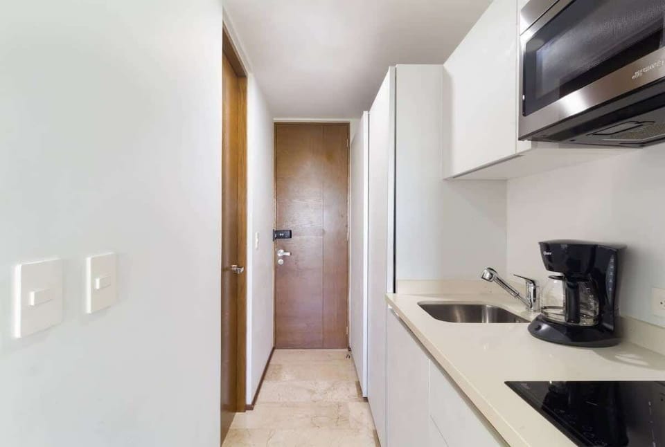The kitchen space is comfortable and has all the necessary equipment to make you feel at home.