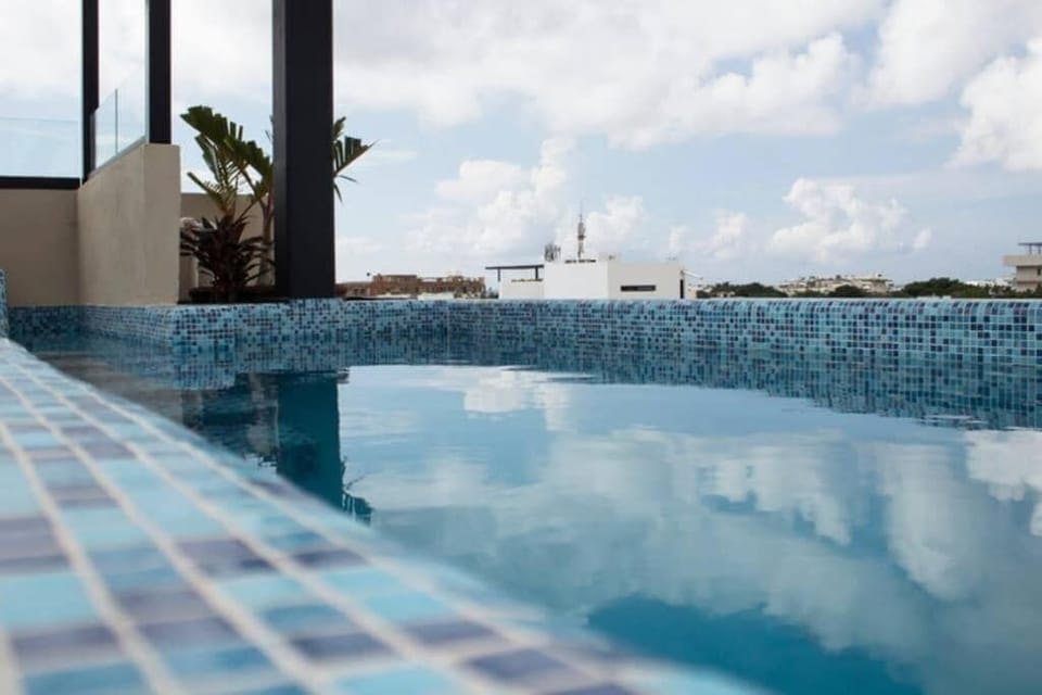 From the rooftop pool you can enjoy one of the best views of Playa del Carmen