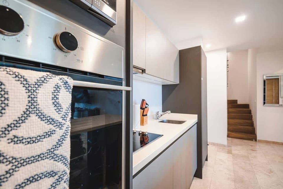 Modern kitchen; fully equipped for cooking.