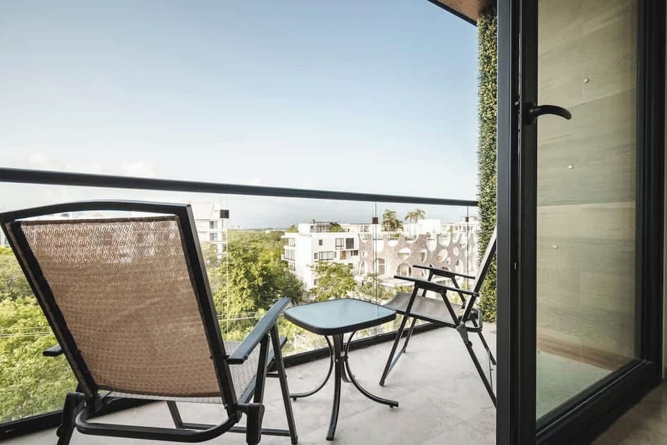 Enjoy the city views from your balcony.