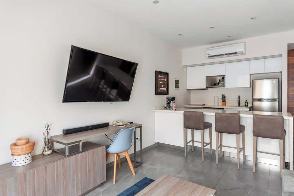 Work, watch, or cook; all in one space.