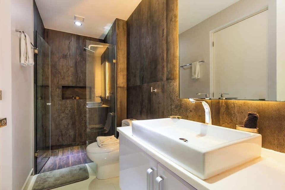 Stylish bathroom with modern amenities.