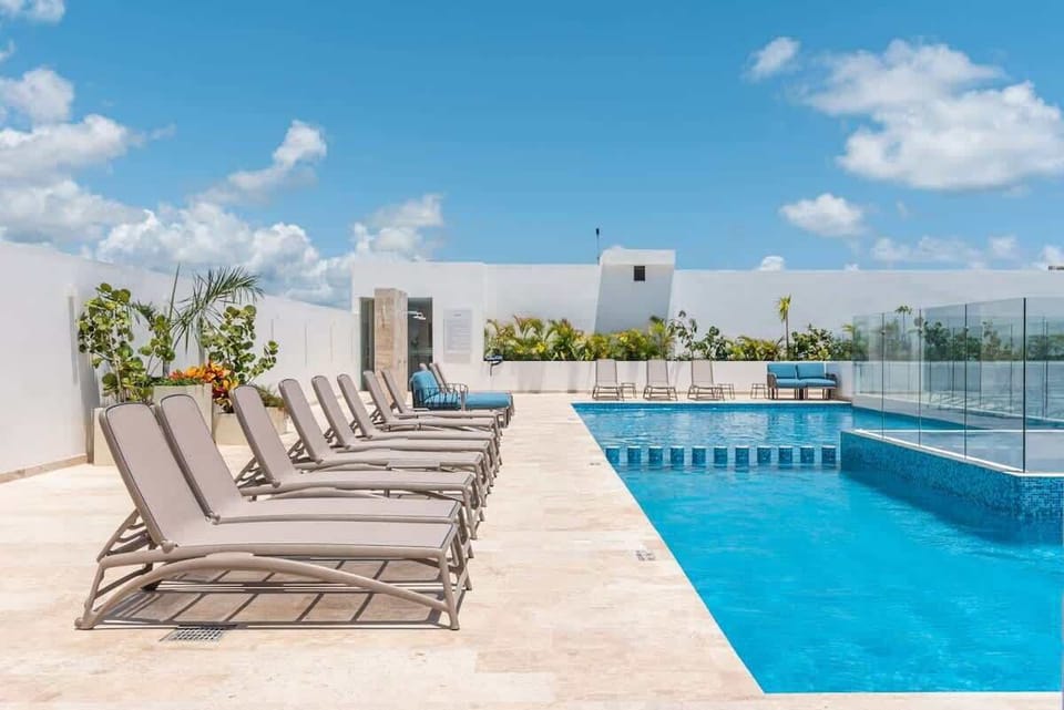 Soak up the sun on our luxurious poolside loungers.