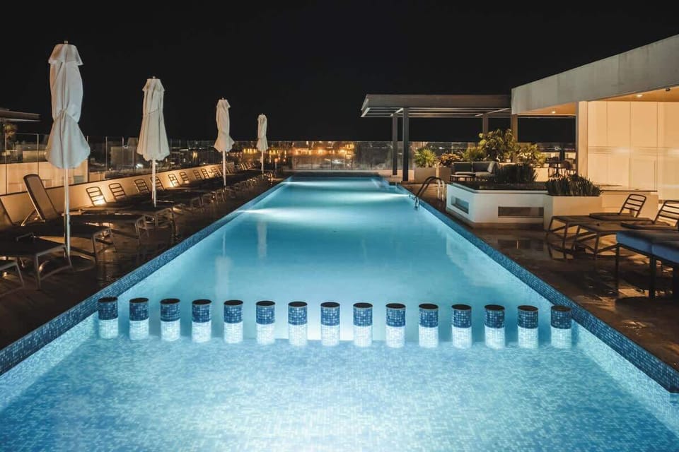 Refreshing rooftop pool, perfect for a relaxing evening.