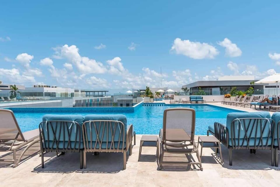 Take a dip in our stunning rooftop pool – ocean views included!