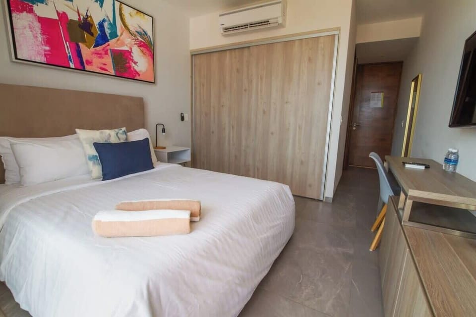 Luxurious bedroom; comfortable and stylish.