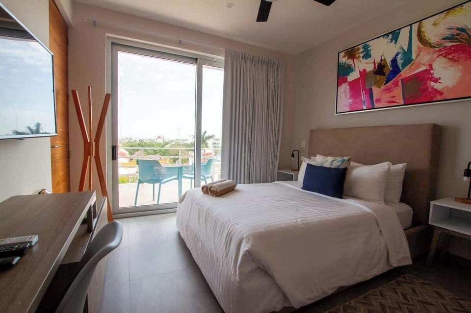 Luxurious master bedroom; queen bed.