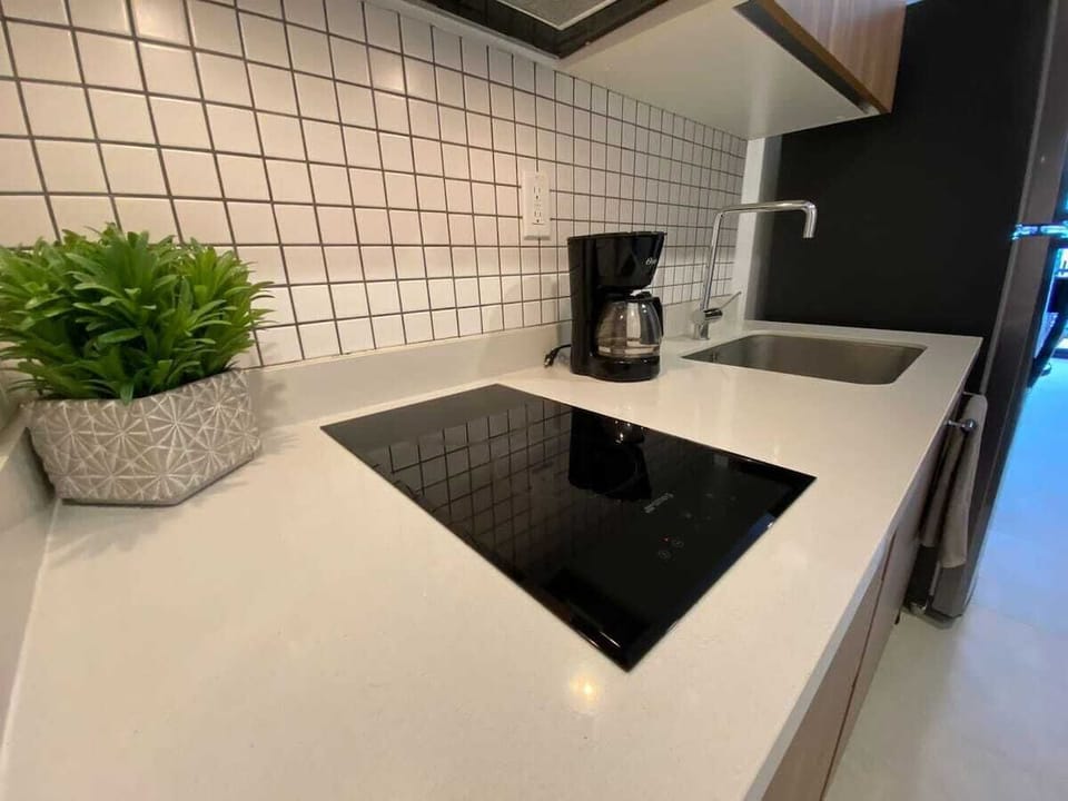 Compact and stylish kitchen space designed for convenience.