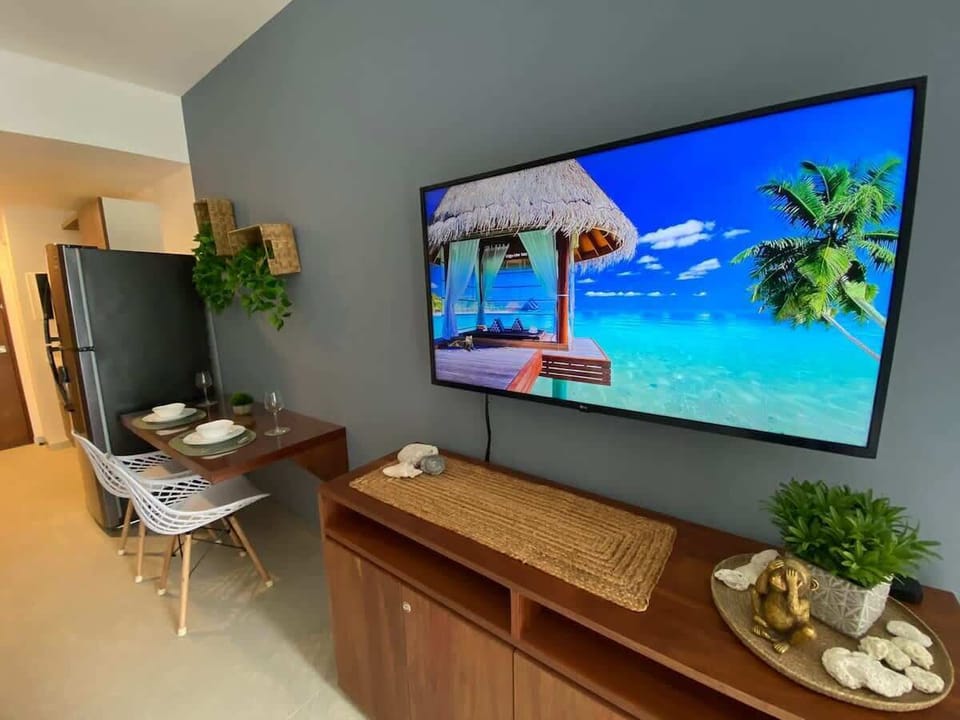 Cozy living area with smart TV for your entertainment.
