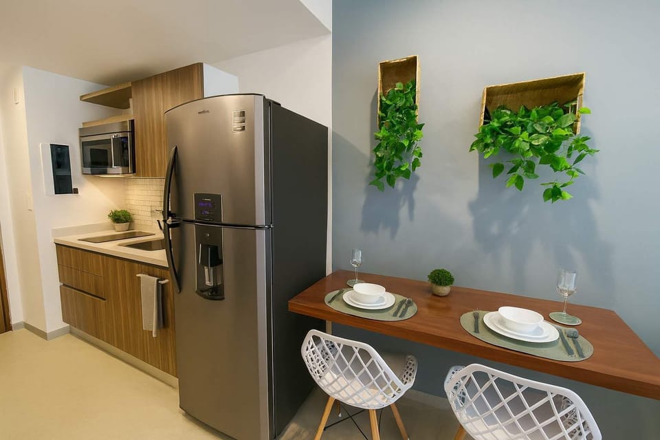 Fully equipped kitchen with modern appliances.