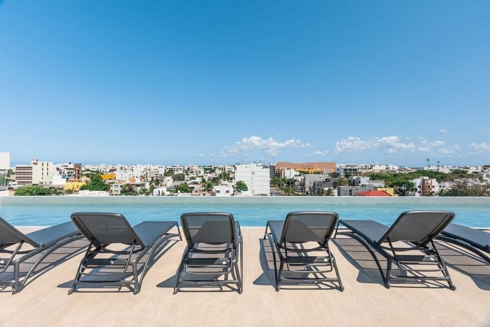 Stunning rooftop pool with panoramic city views.