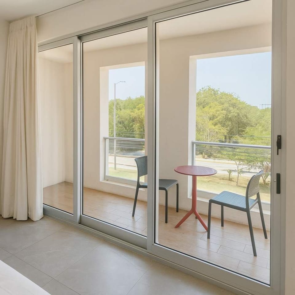 Enjoy your morning coffee on your private balcony.
